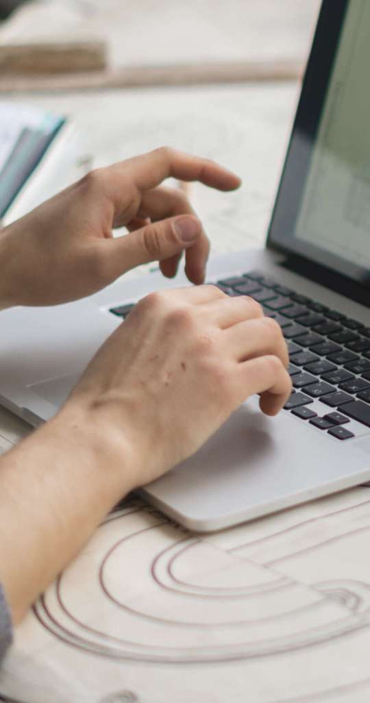 graphic designer doing calculations on the new building schemes